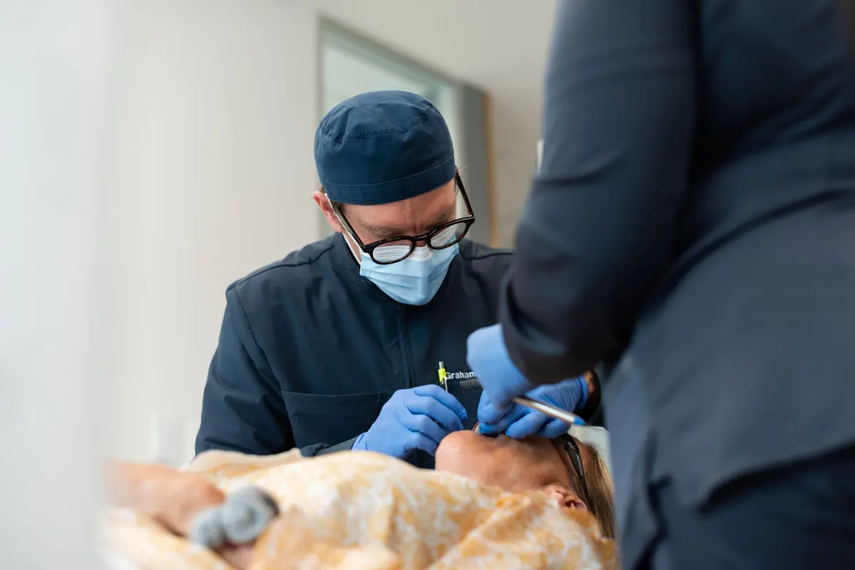 Dr. Forbes with patient